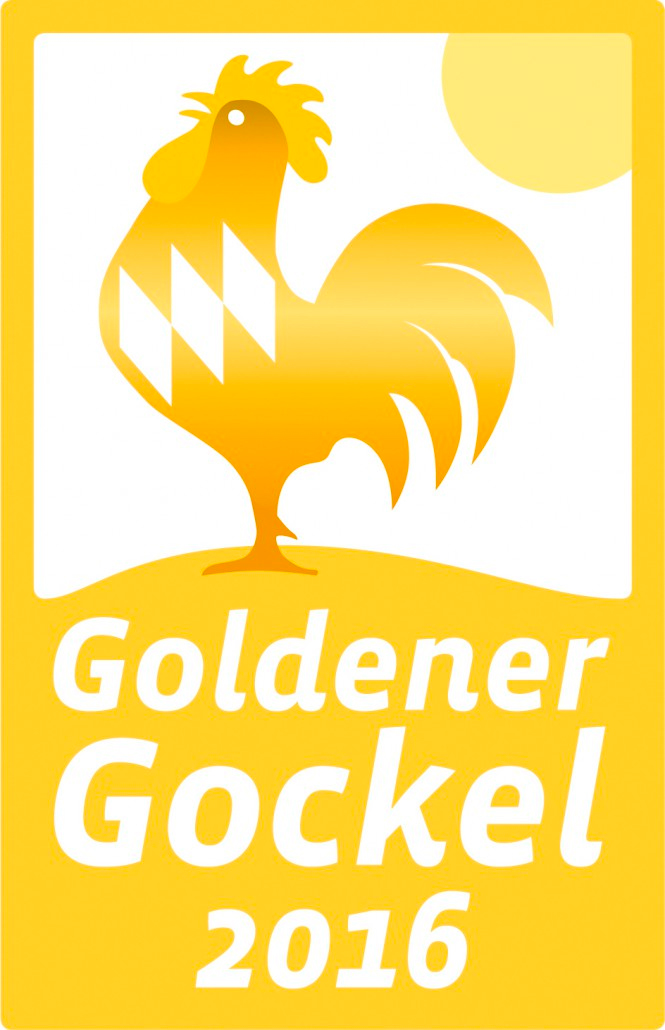 01 zacherlhof goldener gockel